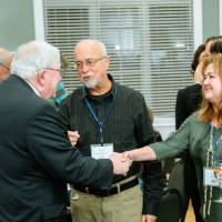 woman shaking president lubbers hand